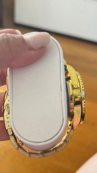 Reloj Dorado con Bisel Azul Sin usar  Costó 100e