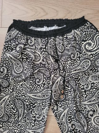 Pantalones elásticos estampado étnico