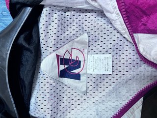 Giacca a vento vintage Razorbacks anni '90
