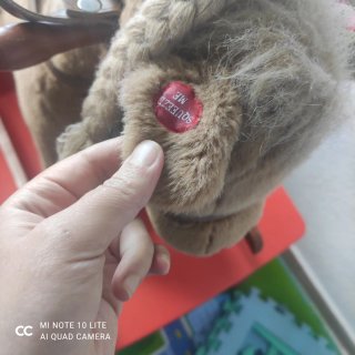 Caballo balancín peluche