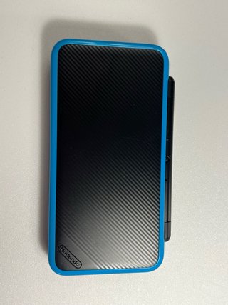 New Nintendo 2DS XL  + 5 Juegos + 2 amiibos