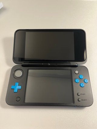 New Nintendo 2DS XL  + 5 Juegos + 2 amiibos