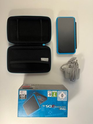 New Nintendo 2DS XL  + 5 Juegos + 2 amiibos