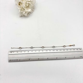 Pulsera de oro 18kt con circonitas