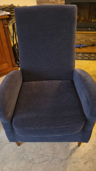 Sillón orejero azul tela