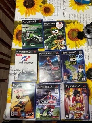 PlayStation 2 Gris con 8 juegos o cambio por PS3