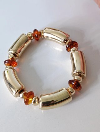 Pulsera elástica dorada con cuentas ámbar