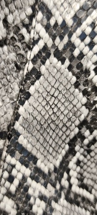 Botines de tacón con estampado de serpiente