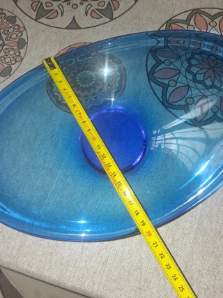 Elegante centro de mesa de cristal azul