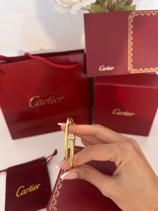Lote Cartier: Anello e Bracciale in Oro