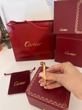 Lote Cartier: Anello e Bracciale in Oro