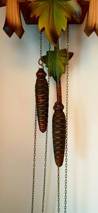 Orologio a cucù in legno con uccellino