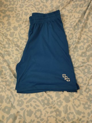 Pantalón corto deportivo hombre azul