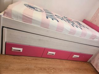 Cama nido rosa y blanco