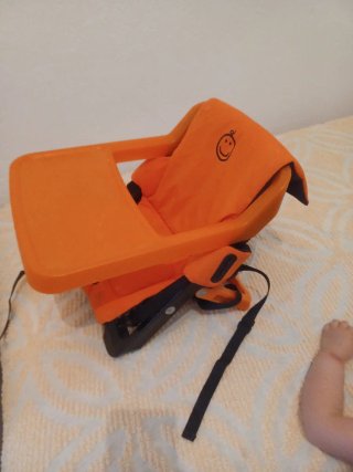 Silla de suplemento naranja