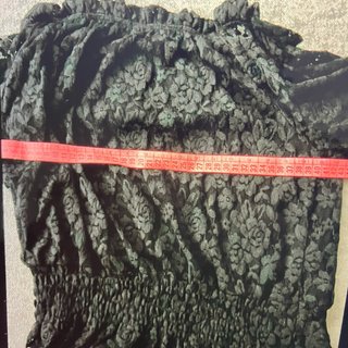Blusa de encaje negro