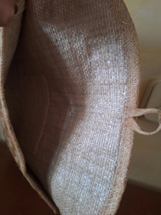 Cartera de mano tejida artesanal
