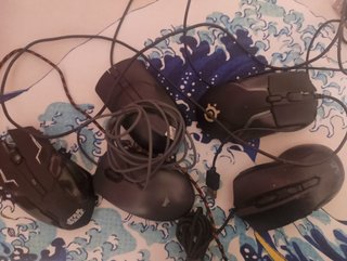 Ratones Logitech Grises y Negros