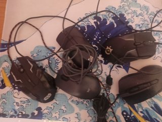 Ratones Logitech Grises y Negros