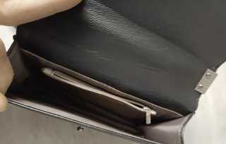 Pochette nera con catena donna