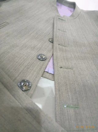 Traje corto hombre verde sin usar talla 40