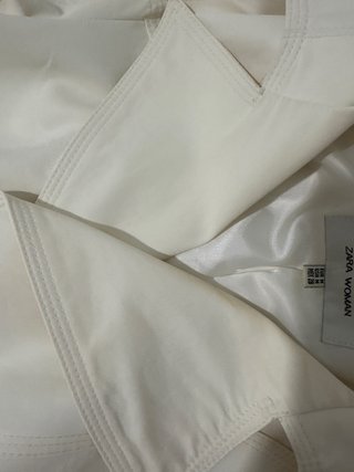 Gabardina blanca