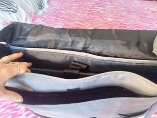 Mochila portátil Soyntec gris y amarilla