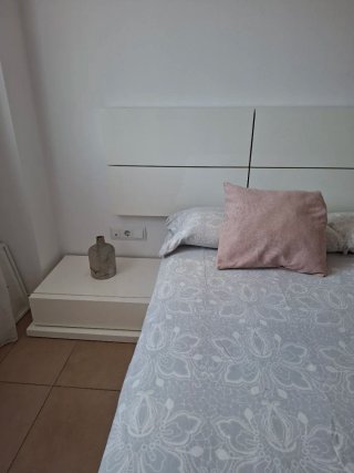 Dormitorio de matrimonio blanco