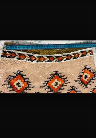 Preciosa Falda de lentejuelas con estampado étnico