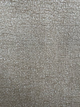 Sillón beige de tela