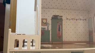 Casa de muñecas de madera