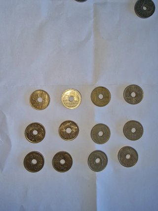 Lote de  12 monedas de 25 céntimos.
