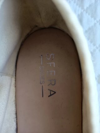 Zapatos planos Sfera beige con borlas