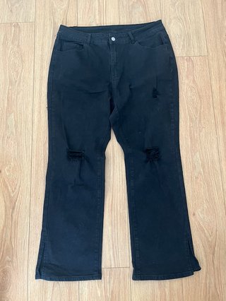 Pantalones vaqueros negros tiro alto rotos