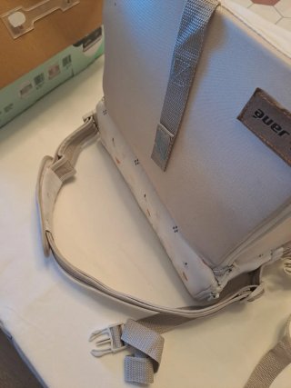 Jané Asiento Elevador Convertible en Bolso