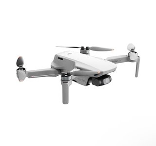 Pacchetto Dron DJI Mini 4K Vuela Más + parasole per trasmettitore