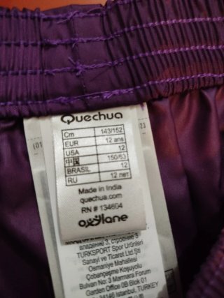 Conjunto impermeable Quechua niña morado