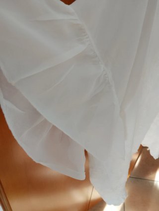 Blusa avorio con ricami floreali