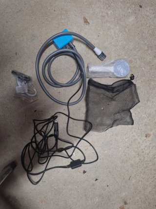 Tienda Ducha Portátil Quechua y ducha con motor