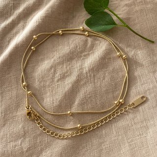 Collar serpiente dorado con bolitas
