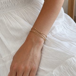 Collar serpiente dorado con bolitas