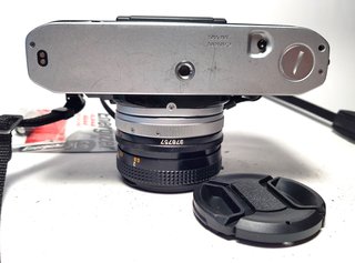 Canon AE-1 con objetivo FD f=50mm 1:1.8 SC