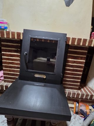 Puerta de chimenea a medida con marco