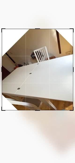 Mesa extensible blanca con 4 sillas