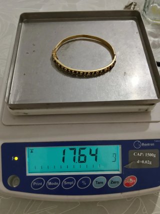 Pulsera tipo caña con piedras  18 kt 17.64 gr