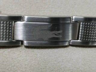 Pulsera Lacoste Plata y Blanco