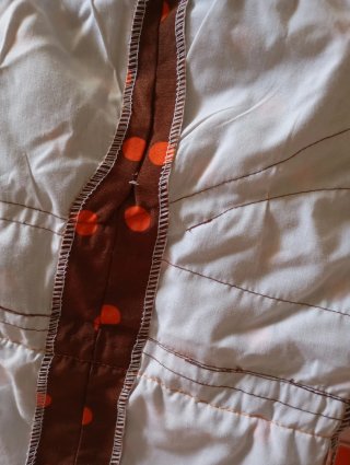 Traje de flamenca marrón y naranja