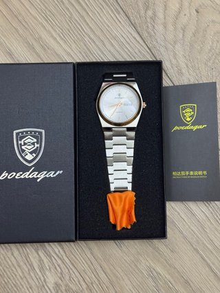 Reloj Poedagar Oro y Plata