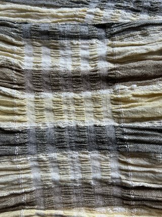 Pashmina con arricciature e frange