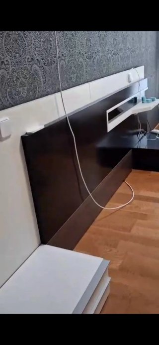 Mueble cabecero con mesitas integradas